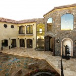 Tuscan style courtyard with mosaic tile peacock
