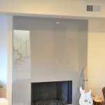 Modern glass fireplace with gray color