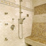 Interior of shower with tiled walls and tiled bench and decorative mosaic