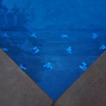 Concrete floor, blue stairs leading to the pool, blue and brown colors combination
