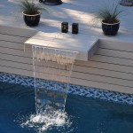 Waterfall attached to trex deck flowing into the pool